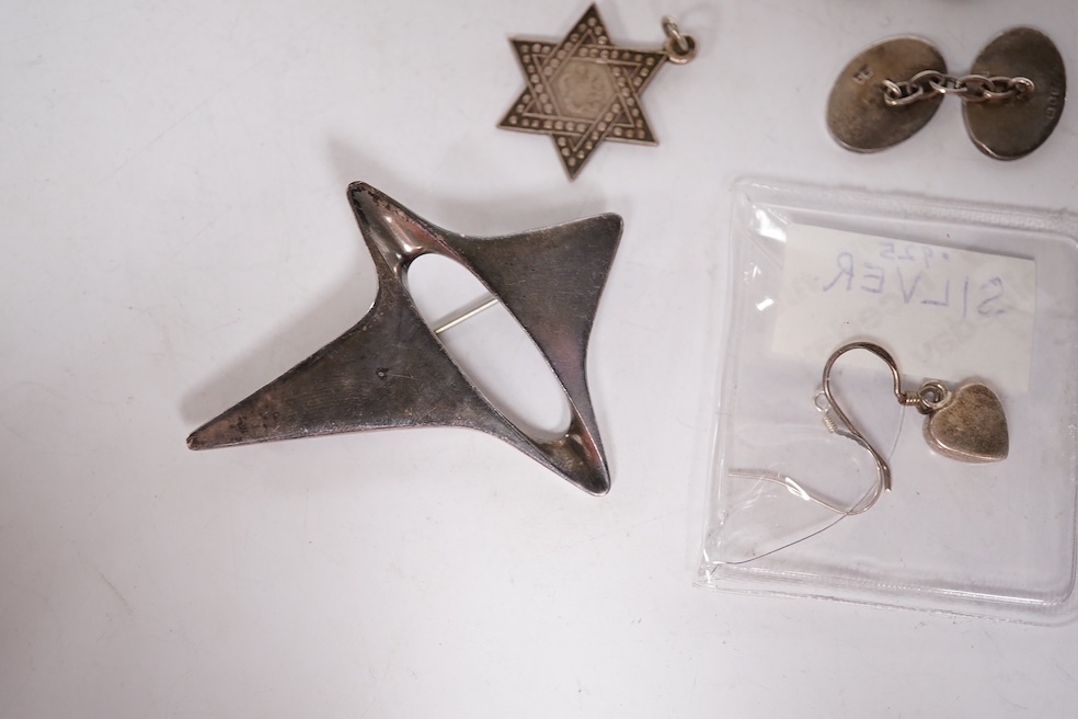 An early 1960's Georg Jensen sterling brooch, no. 339 (designed by Henning Koppel, 58mm, together with a small group of jewellery and other items including a pair of silver oval cufflinks, a Persian coin necklace, a 14ct